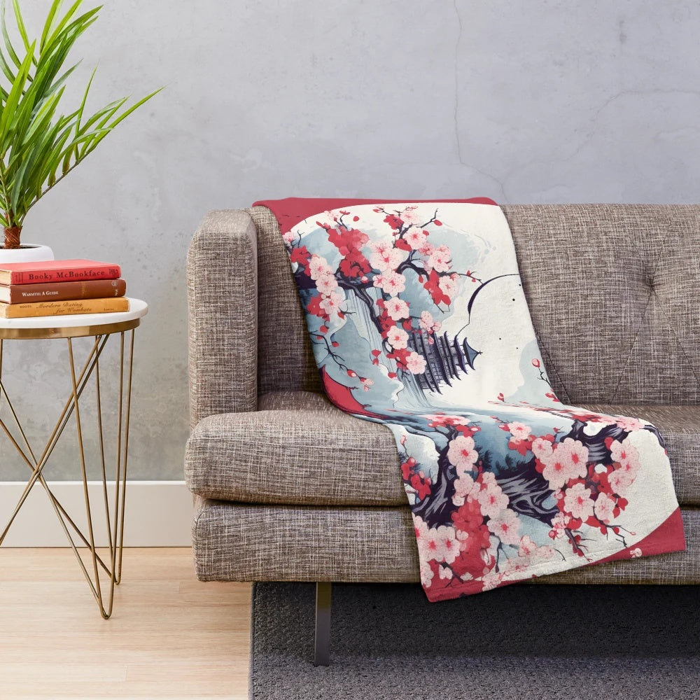 Cozy plush blanket featuring a Japanese-inspired design with a tower silhouette and cherry blossoms