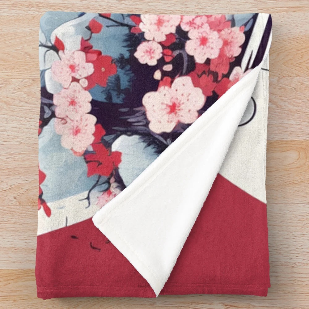 Cozy plush blanket featuring a Japanese-inspired design with a tower silhouette and cherry blossoms