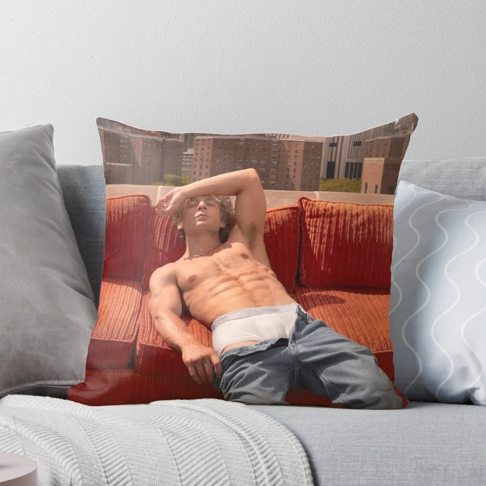 A stylish and modern throw pillow featuring a portrait of actor Jeremy Allen White