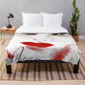 Colorful plush blanket featuring a portrait of classic movie star Joan Crawford