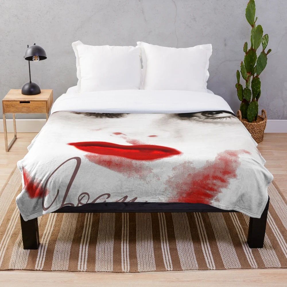 Colorful plush blanket featuring a portrait of classic movie star Joan Crawford