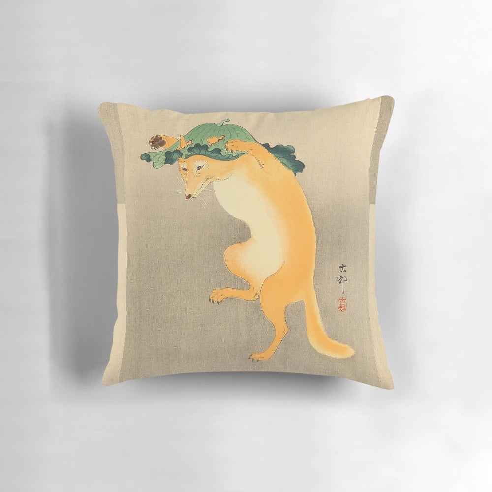 Decorative pillow featuring a whimsical illustration of a fox wearing a lotus-leaf hat, inspired by traditional Japanese ukiyo-e art.