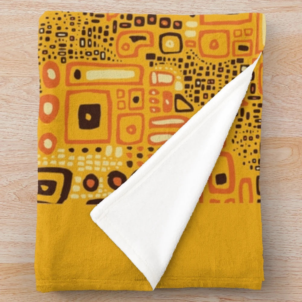 Klimt-inspired plush blanket with intricate golden pattern