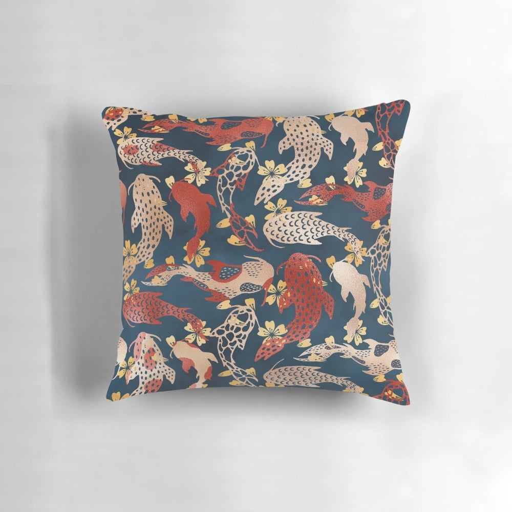 Decorative pillow featuring a vibrant Japanese-inspired koi fish pattern in shades of blue, white, and red.