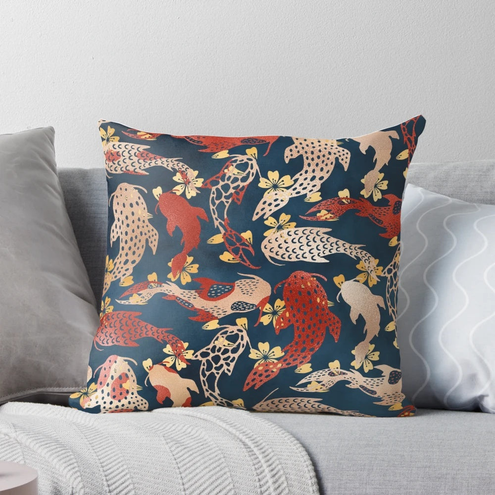 Decorative pillow featuring a vibrant Japanese-inspired koi fish pattern in shades of blue, white, and red.