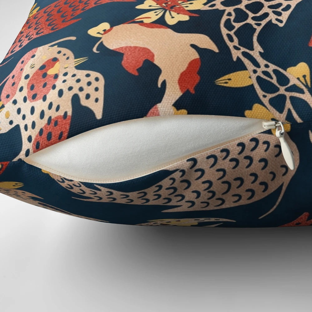 Decorative pillow featuring a vibrant Japanese-inspired koi fish pattern in shades of blue, white, and red.