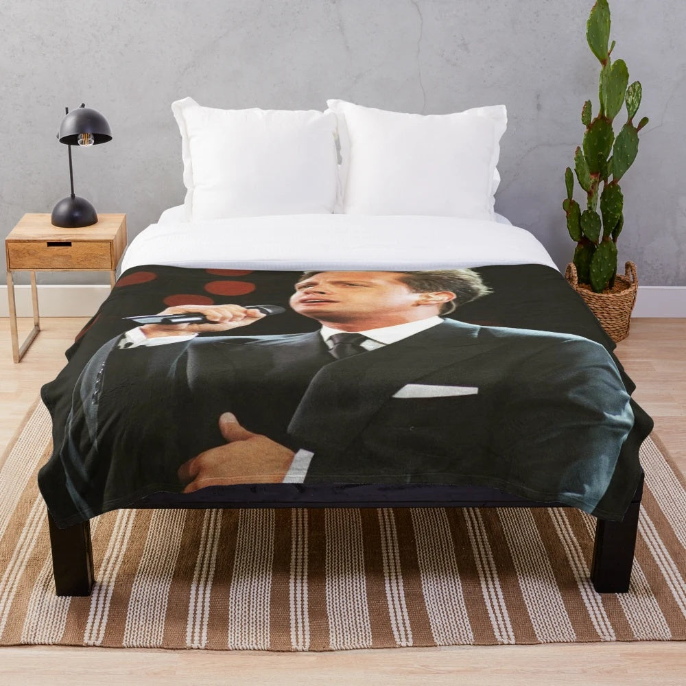 Soft and cozy plush blanket featuring an abstract portrait of Mexican singer Luis Miguel