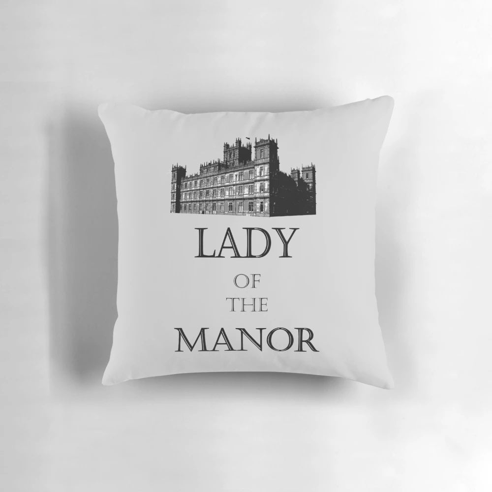 Decorative throw pillow with elegant manor-inspired design, perfect for Downton Abbey fans.