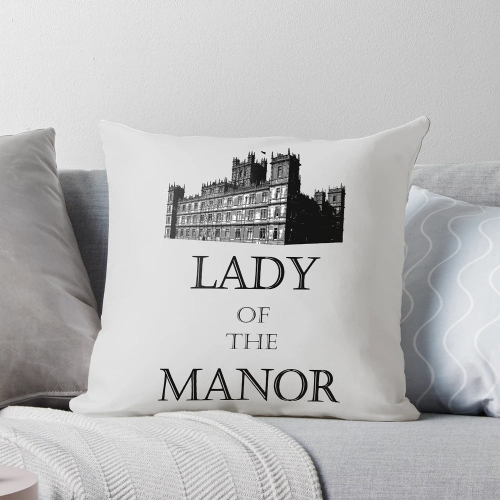 Decorative throw pillow with elegant manor-inspired design, perfect for Downton Abbey fans.