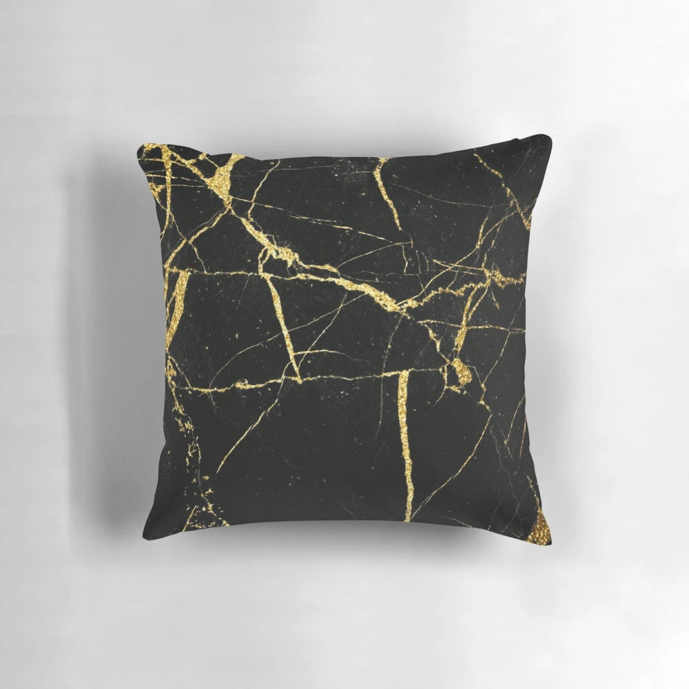 Luxurious black and gold marble-patterned decorative pillow