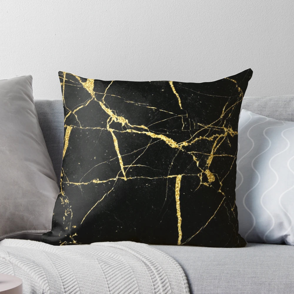 Luxurious black and gold marble-patterned decorative pillow