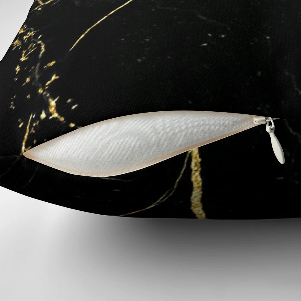 Luxurious black and gold marble-patterned decorative pillow