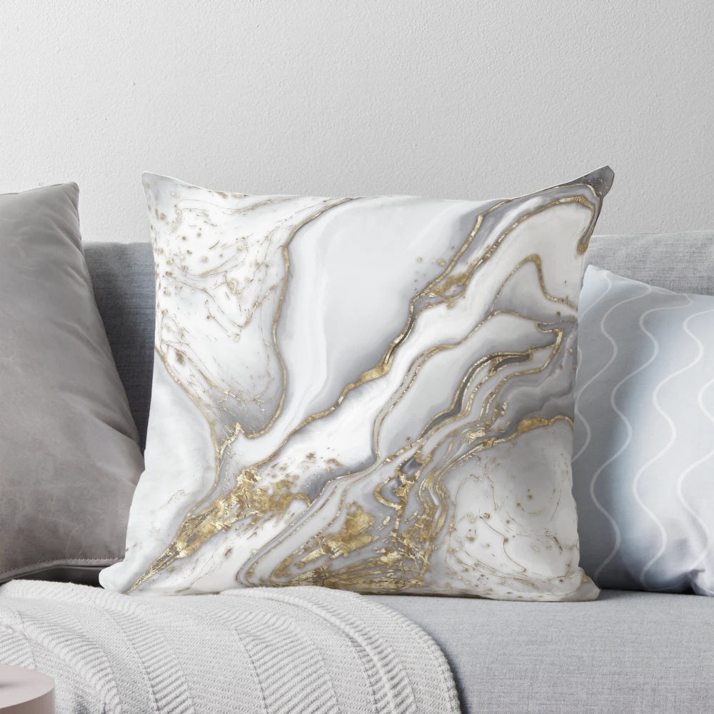 Sophisticated marble-patterned luxury throw pillow in gold, pearl, and ivory tones