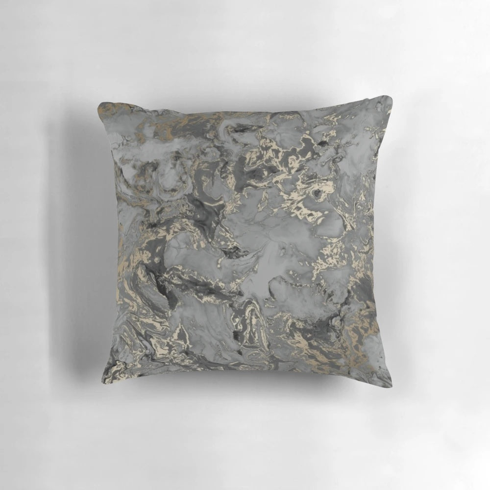 Marbled pattern throw pillow in gold, black, and grey colors