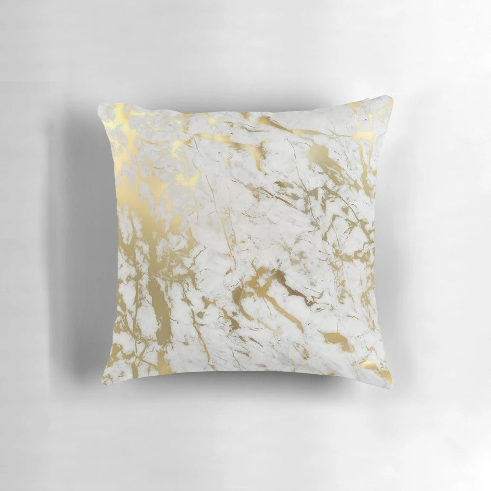 Decorative pillow featuring a minimalist, natural marble pattern with subtle gold accents.