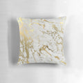 Decorative pillow featuring a minimalist, natural marble pattern with subtle gold accents.