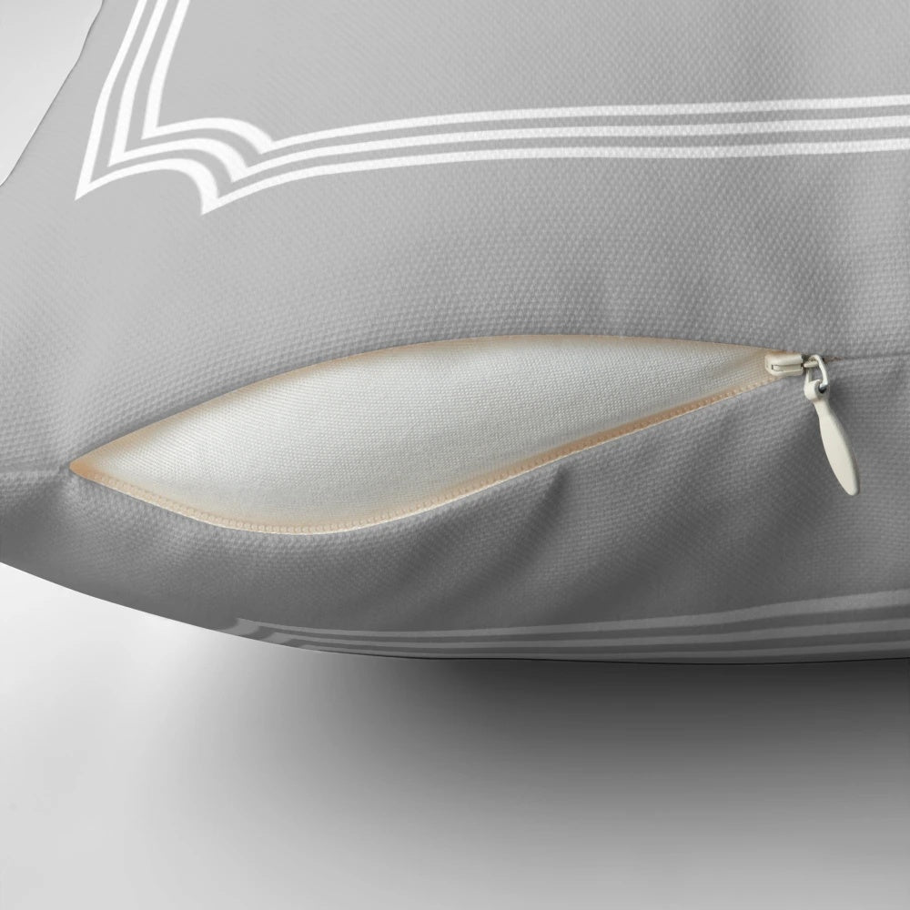 Silver gray monogram K pillow with a minimalist, elegant design