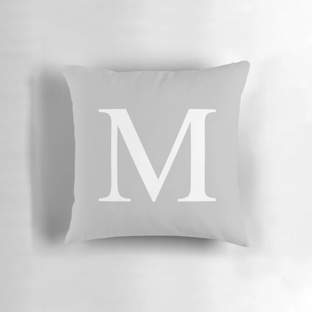 Silver gray monogram M pillow with a minimalist, classy design