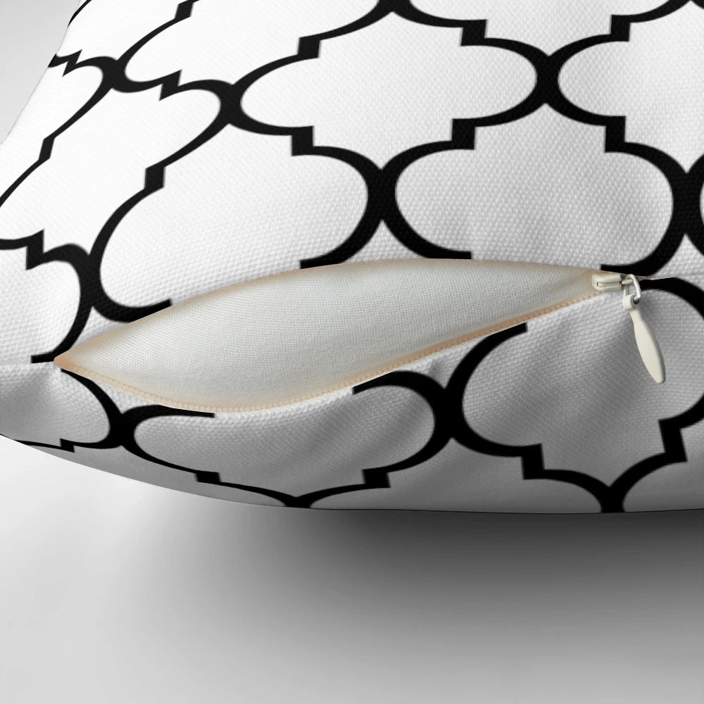 Moroccan trellis pattern decorative throw pillow in black and white