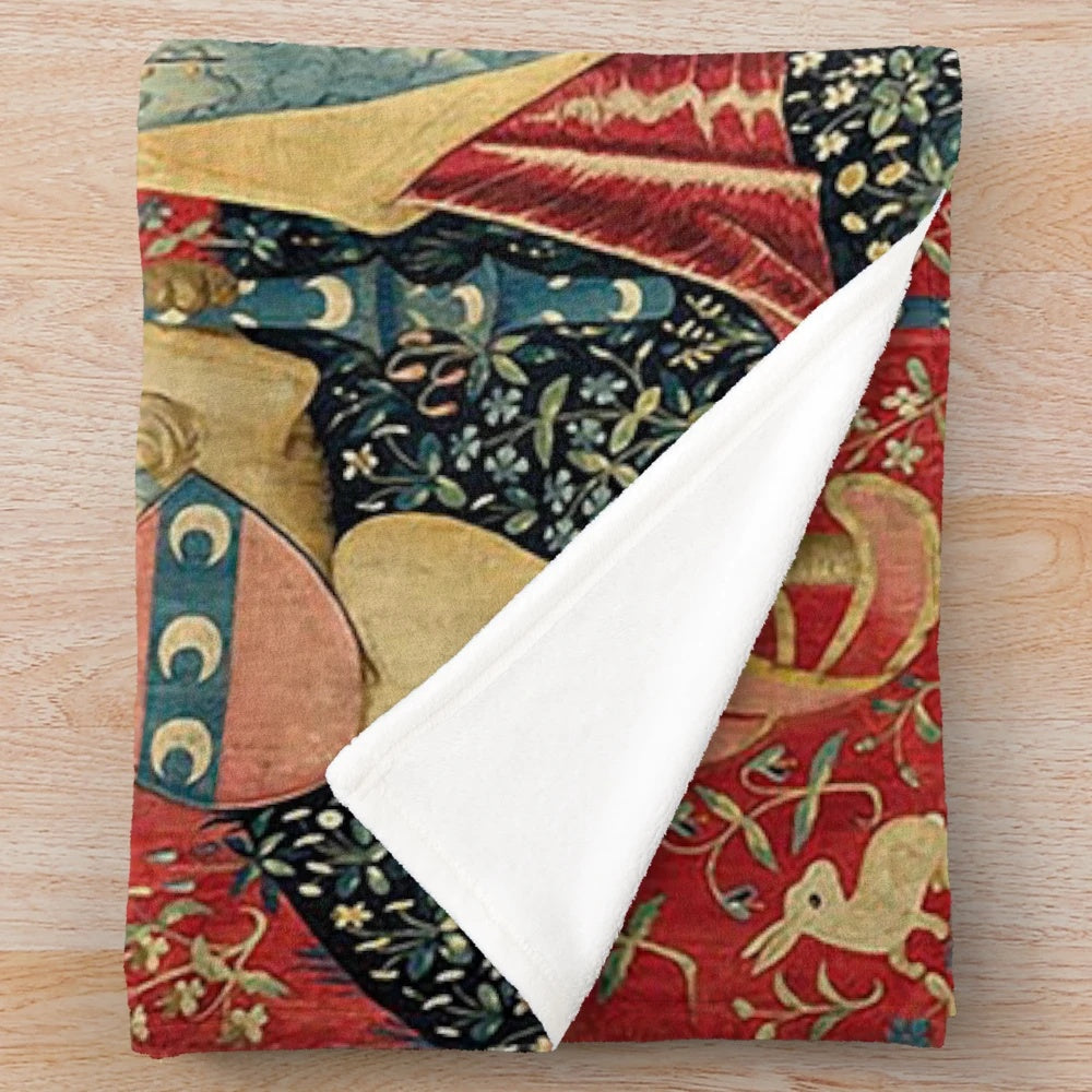 Plush blanket featuring a mystical unicorn design inspired by the medieval tapestry "The Lady and the Unicorn