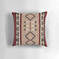 A beautifully-crafted pillow featuring a vibrant Navajo-inspired pattern, perfect for adding a touch of tribal style to any space.
