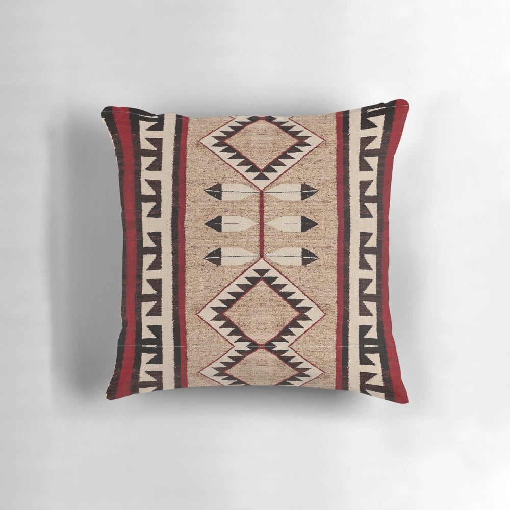 A beautifully-crafted pillow featuring a vibrant Navajo-inspired pattern, perfect for adding a touch of tribal style to any space.