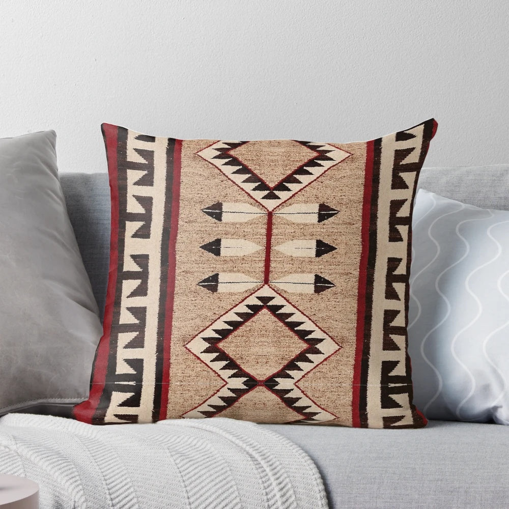 A beautifully-crafted pillow featuring a vibrant Navajo-inspired pattern, perfect for adding a touch of tribal style to any space.