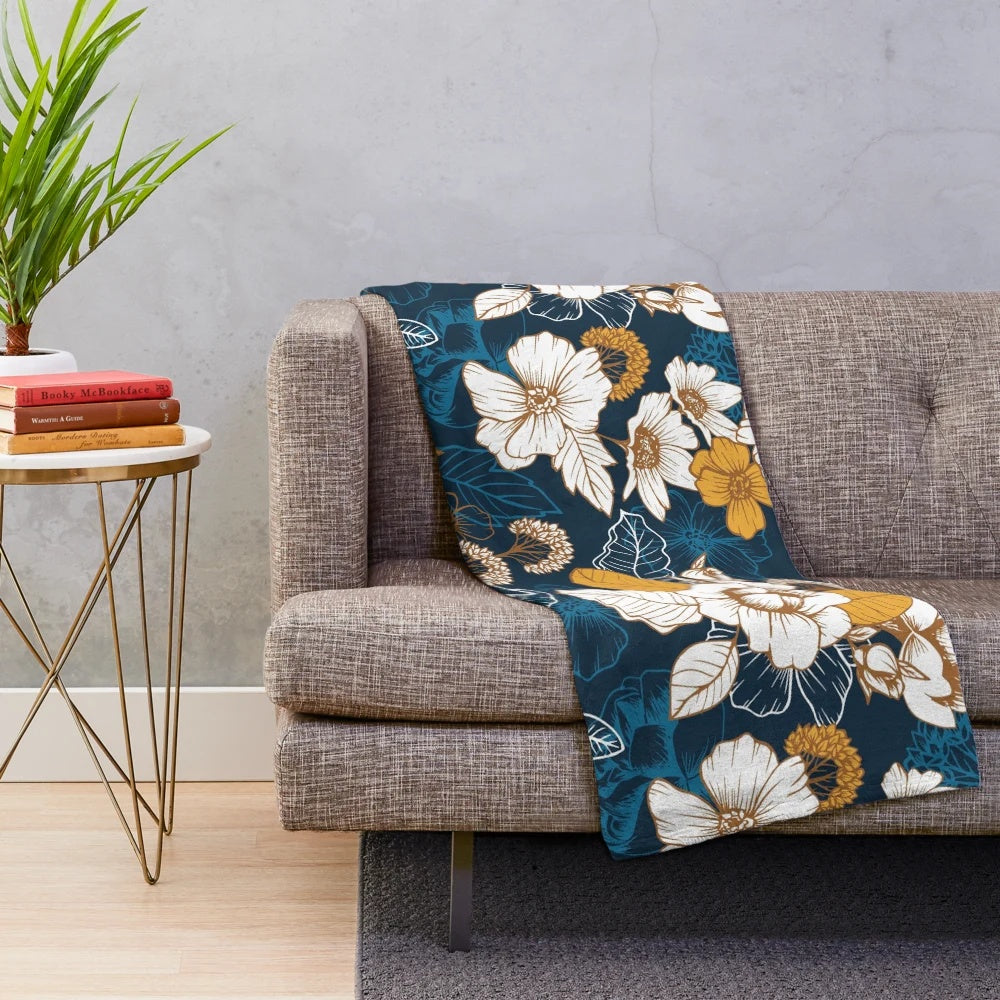 Navy and gold floral plush blanket with seamless peony and blossom pattern