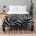 Navy blue and gold zebra print plush blanket
