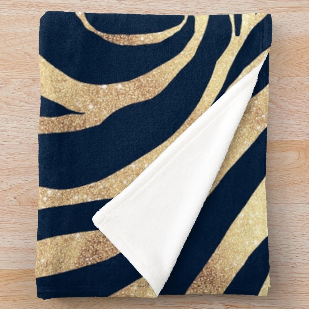 Navy blue and gold zebra print plush blanket