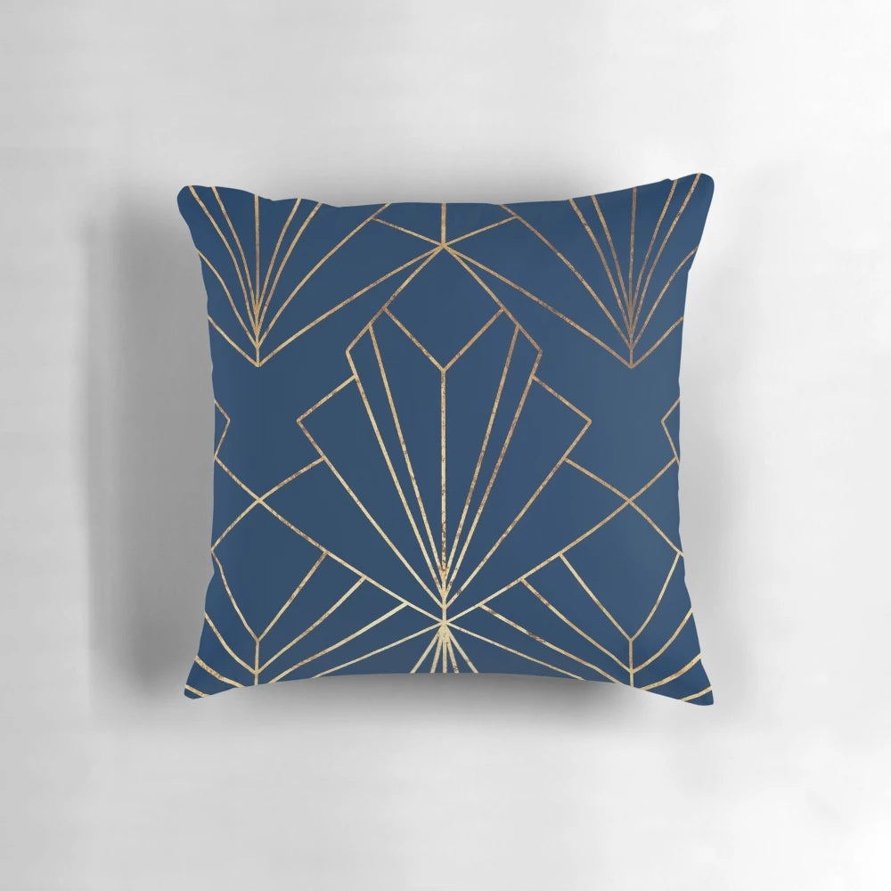 Navy blue art deco inspired pillow with a modern geometric line art design in gold foil