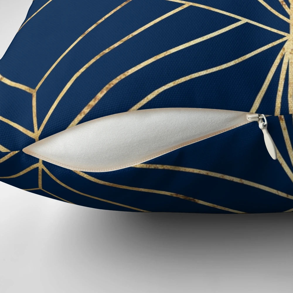 Navy blue art deco inspired pillow with a modern geometric line art design in gold foil