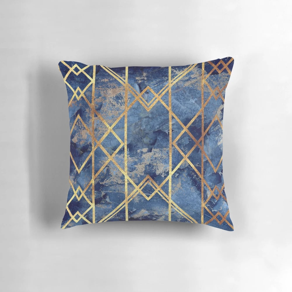 Navy and gold geometric stone patterned throw pillow with a modern, abstract design
