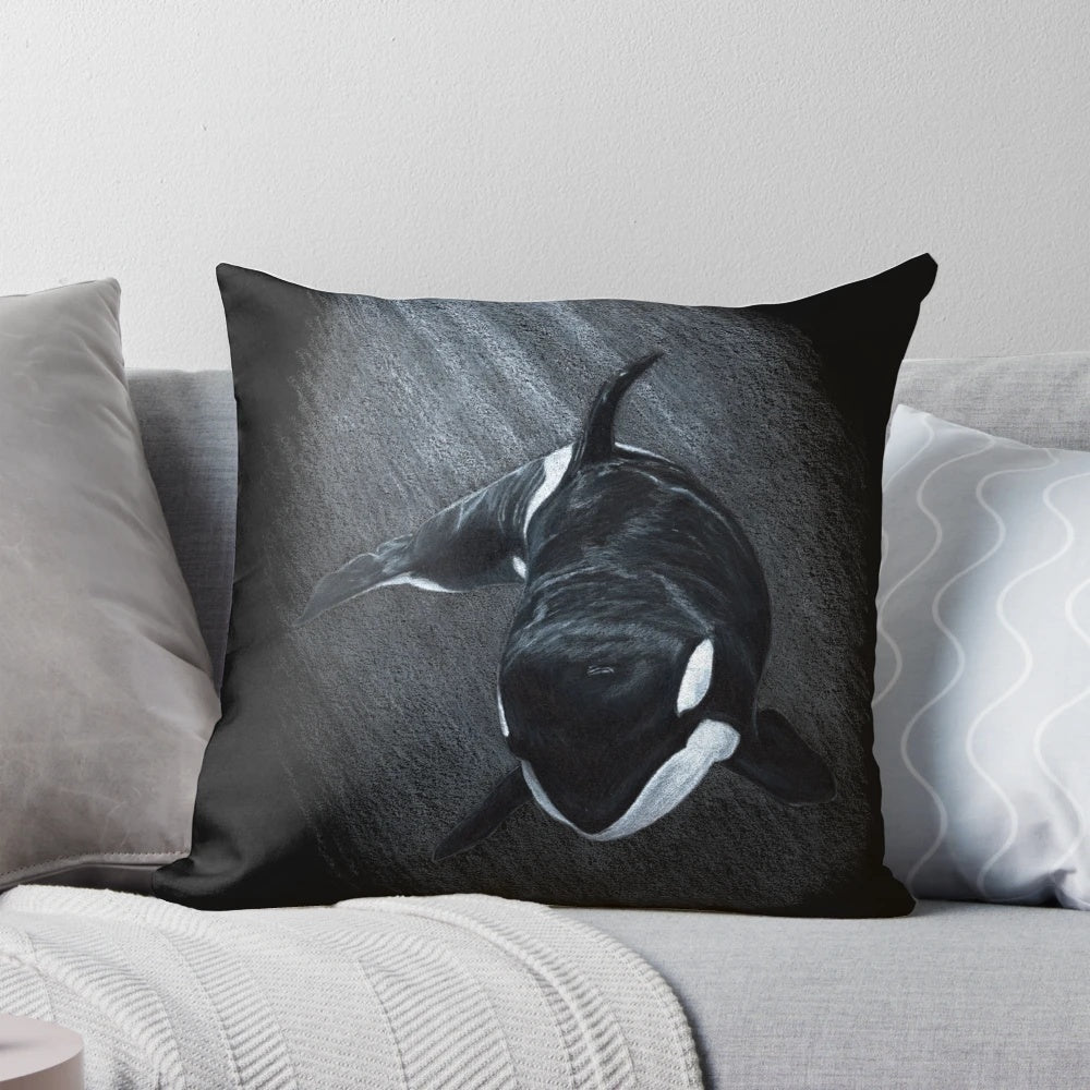 Soft, plush orca-shaped pillow in a monochrome black and white color scheme