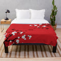 Soft and cozy plush blanket with delicate oriental cherry blossom design