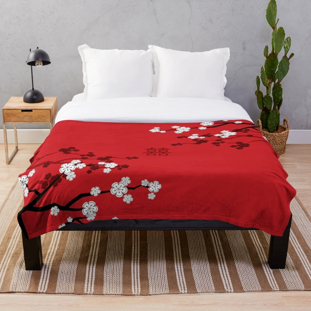 Soft and cozy plush blanket with delicate oriental cherry blossom design