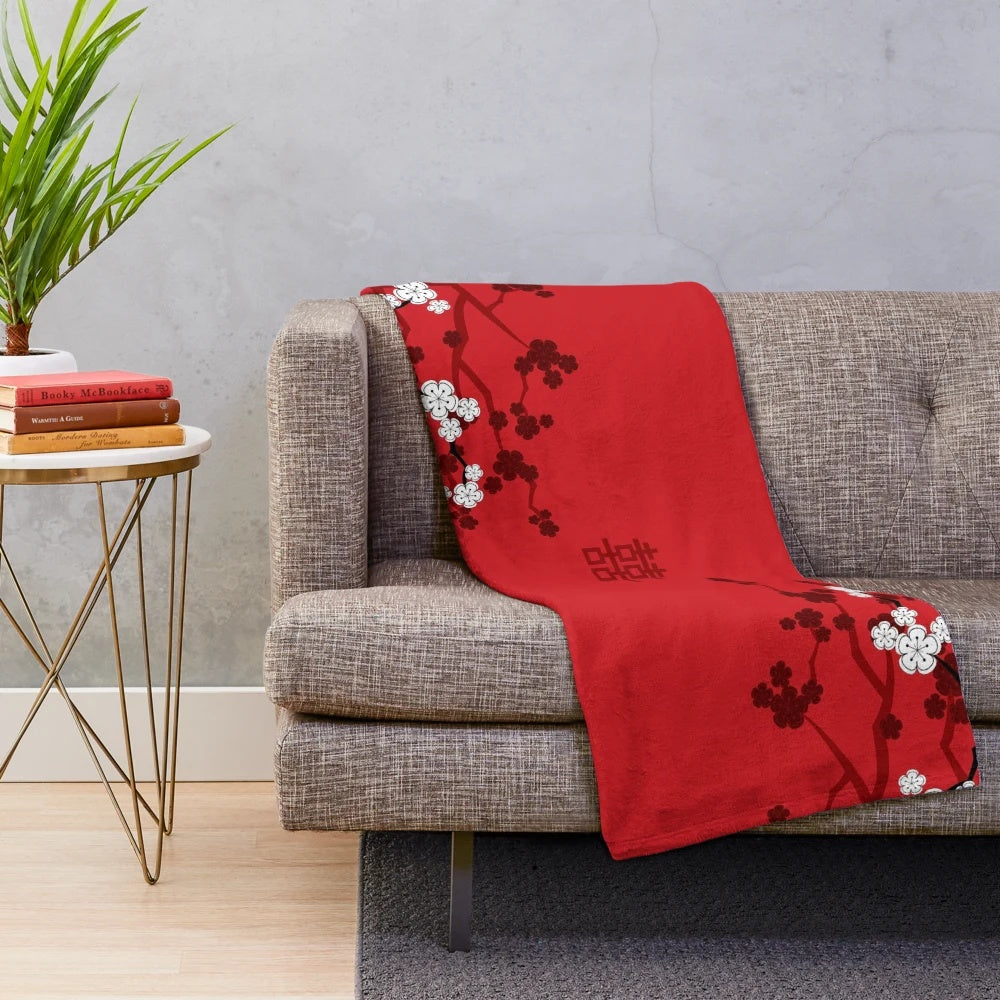 Soft and cozy plush blanket with delicate oriental cherry blossom design