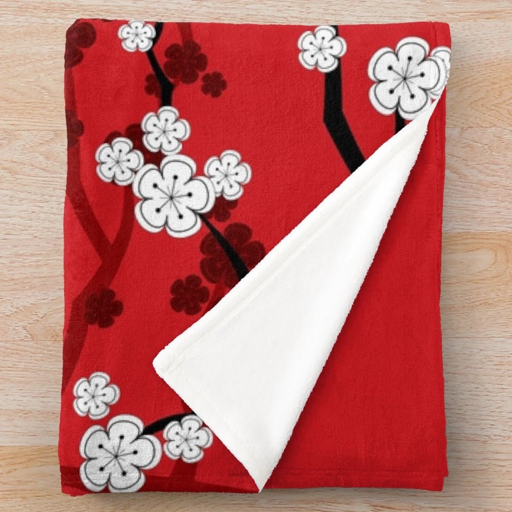 Soft and cozy plush blanket with delicate oriental cherry blossom design