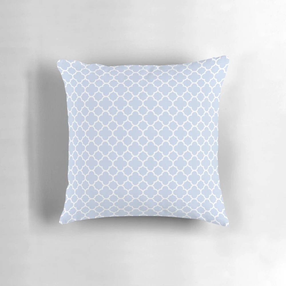 Pale blue and white quatrefoil patterned decorative pillow