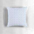 Pale blue and white quatrefoil patterned decorative pillow