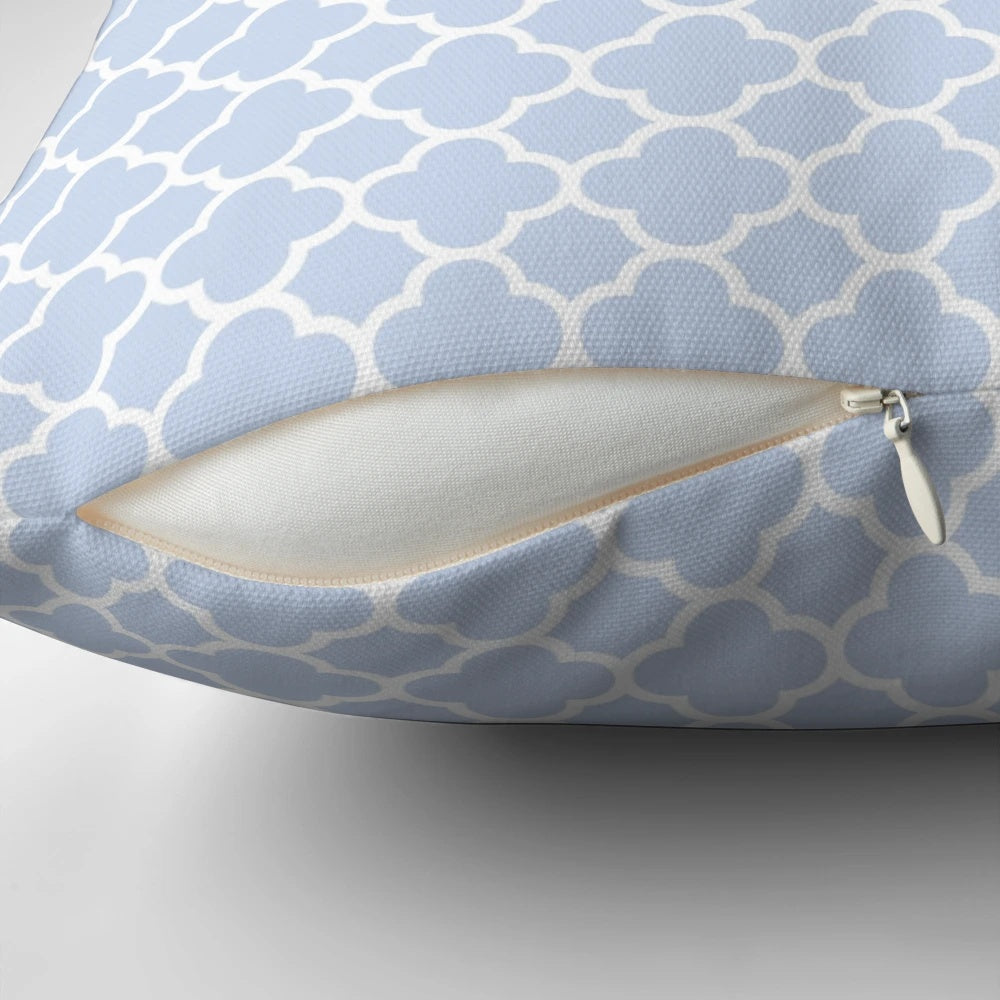 Pale blue and white quatrefoil patterned decorative pillow
