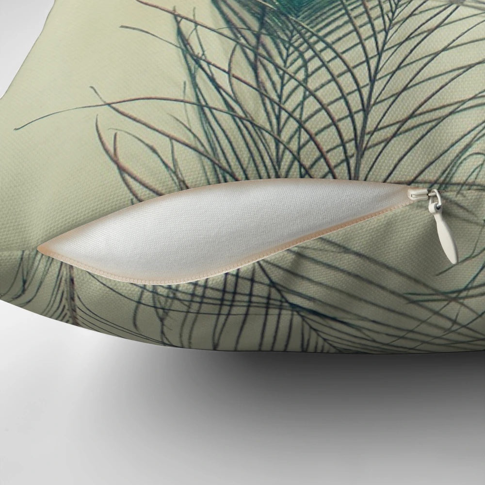 Decorative throw pillow featuring a stunning arrangement of peacock feathers in shades of turquoise, electric blue, emerald green, grey, gold, and bronze.