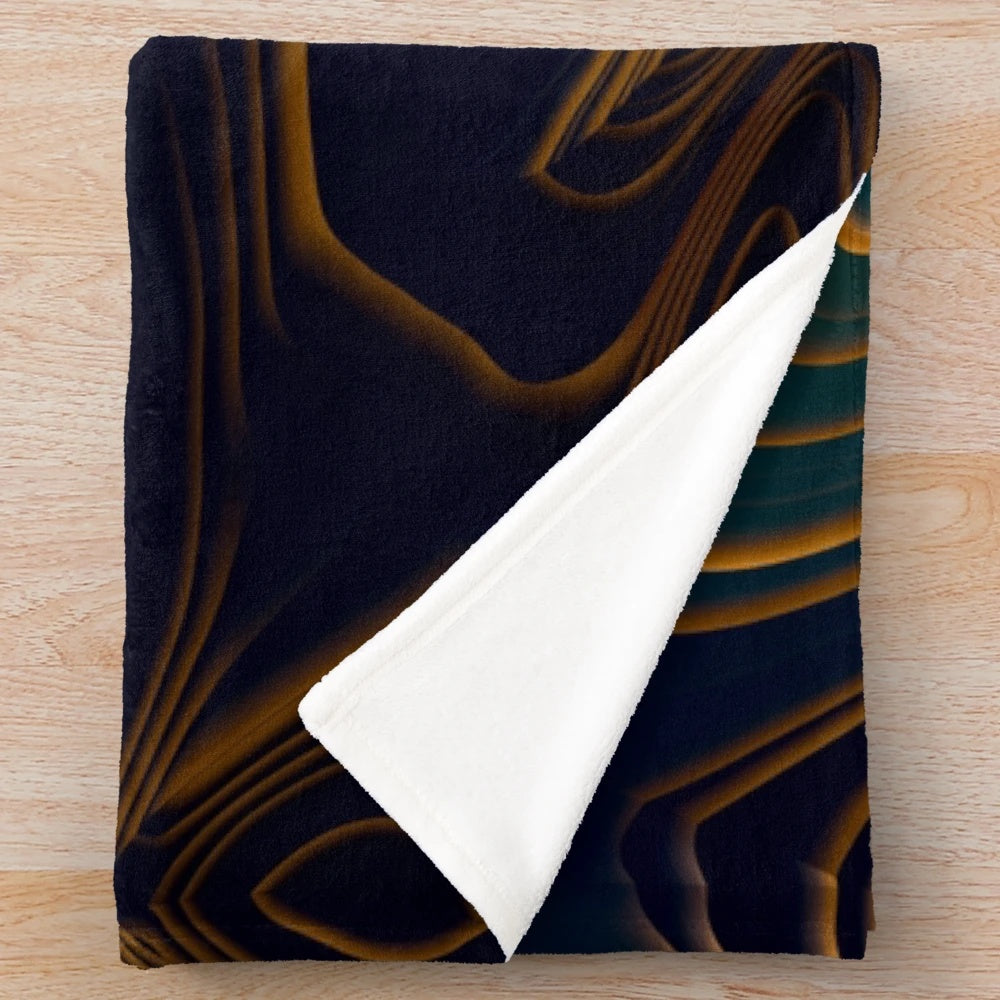 Peacock-inspired plush blanket with abstract ocean-like patterns and metallic accents