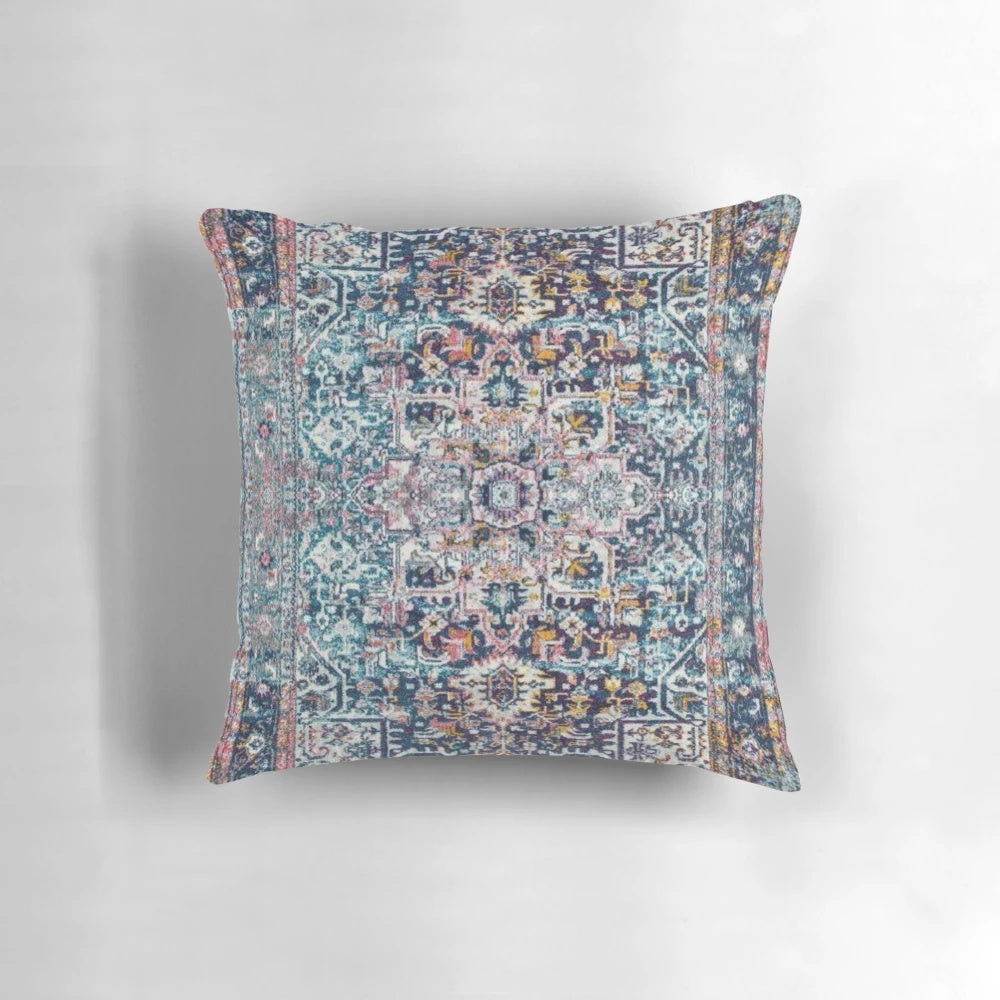 Persian antique carpet pattern pillow with blue, gold, and ochre colors.
