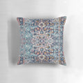 Persian antique carpet pattern pillow with blue, gold, and ochre colors.