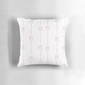 Soft and plush pink pillow with delicate bow ribbon detail, perfect for creating a cozy and stylish ambiance.