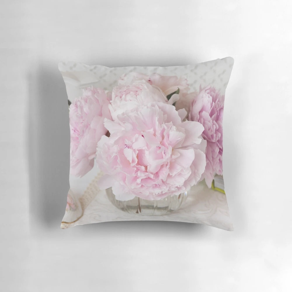Soft and feminine pink peonies floral design on a plush accent pillow