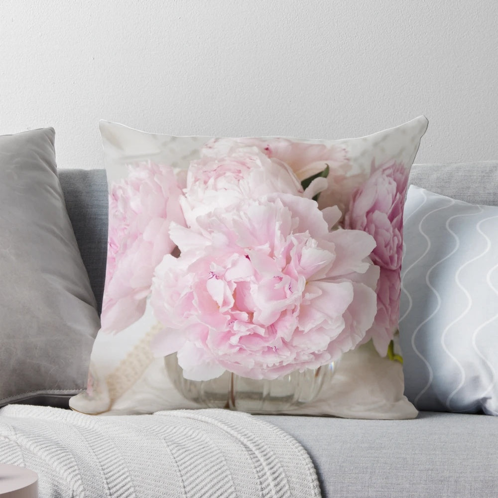 Soft and feminine pink peonies floral design on a plush accent pillow