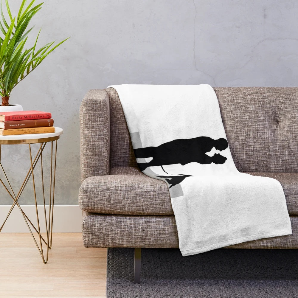 Plush blanket featuring a silhouette design inspired by the classic film The Thin Man