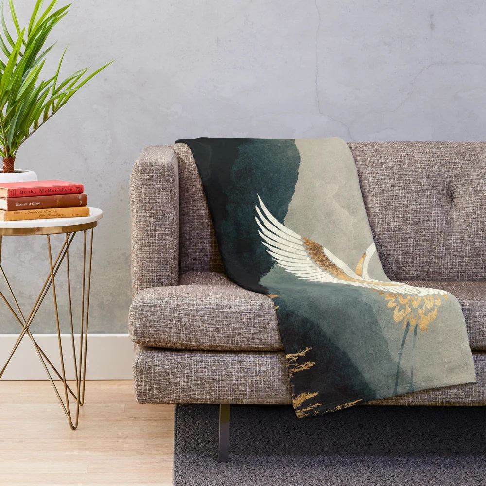 Elegant plush blanket with a nature landscape design featuring a crane bird in flight